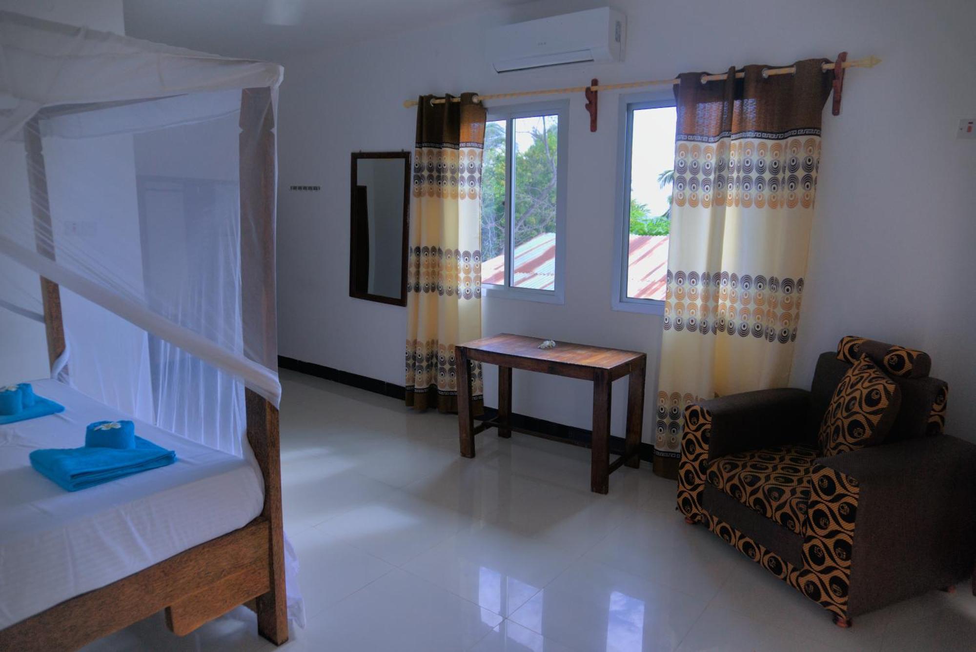 Cocolala Beach House Нунгви Стая снимка